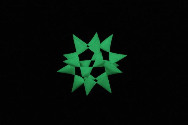 a green glow in the dark twenty-pointed star a green glow in the dark twenty-pointed star