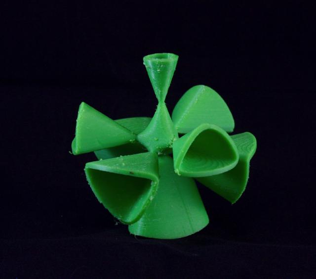 a weird green 3d printed surface. a central body connects to eight others. a weird green 3d printed surface. a central body connects to eight others.